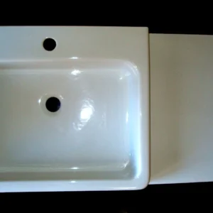 Lavabo de cerámica blanca